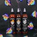 Dustin Poirier Instagram - Less than one week until UFC 299! Show your support for Dustin by grabbing a trio of Poirier’s Louisiana Style Hot Sauce and be one of 500 lucky fans to get a 💎sticker signed by The Diamond himself!