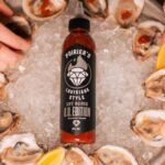 Dustin Poirier Instagram - Two weeks til showtime 🔥💎🔥 What kind of spicy spread are you prepping for UFC 299? From oysters to wings to popcorn, just add Poirier’s Louisiana Style Hot Sauce and you’re snack is set!