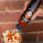 Dustin Poirier Instagram - Two weeks til showtime 🔥💎🔥 What kind of spicy spread are you prepping for UFC 299? From oysters to wings to popcorn, just add Poirier’s Louisiana Style Hot Sauce and you’re snack is set!
