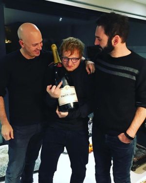 Ed Sheeran Instagram - Divide 7th anniversary throwback dumpington

Explanations below 

1. At the Grammys telling Rihanna Shape of You was originally with her in mind

2. Me and @missjpeg on the set of Shape of You after the sumo fight

3. Just after finishing painting the cover with @damienhirst 

4. Strapped up ready to roll for the Galway Girl vid

5. Celebrating with @rokstoneprod and @jmd_snowpatrol Shape of You going #1 worldwide with a bottle of champs we didn’t end up drinking, it’s still in my cellar, being saved for a special occasion

6. Hanging out with @stormzy after the Ivor’s having won some bronzeware 

7. Couple of beers with @zoeydeutch on the set of Perfect

8. With the guys from the Castle video at the Castle 

9. My birthday in Brazil on the Divide tour, I asked to play a football game with some ex Brazilian national players. We got spanked

10. Final night of the Divide tour, and campaign, in Ipswich, having a pizza and celebrating the most successful era of my career

Til next time x