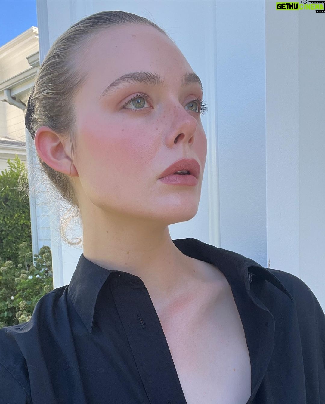 Elle Fanning Instagram - Did my make-up and felt cute in shadow and sun @lorealparis ☀️😎💋