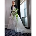 Elle Fanning Instagram - The first fashion show I ever attended was fall 2011 Chanel haute couture and I remember my bubbling anticipation to see what the bride would look like! Karl’s finale bride is always the ultimate. I wanted to combine the innocence of the portrait he took of me with Karl's tradition of ending each show with his vision of the Chanel bride. I have always felt safe going to Vivienne Westwood with my ideas. My original idea didn't have lace, but when I started researching Andreas's recent bridal collections, I saw this lace and it took my breath away. I wanted to include a little black jacket in my look for obvious reasons and I tucked my hair inside as a nod to the gesture of a groom throwing a jacket over his bride's shoulders at the end of the night. @viviennewestwood Karl liked that my jewelry was eclectic and put together the way only a 13 year old would do it. When I look at that portrait it's like a time capsule to that time of my life. Tonight I got to wear the iconic Grain de Cafe coffee bean necklace from 1955 curtesy of @cartier This vintage piece is not my own, but is “my something borrowed” for tonight. Stephen Jones worked alongside team Westwood to custom design the frame for my daisy crown. It was a honor having him in the room with us fitting the frame and ironing the ribbons himself. @stephenjonesmillinery The floral fairies from Belle Fleur turned my hotel room into a flower shop, creating my cascading daisy bouquet, which made my homage complete. @bellefleurny And of course lace nails to match by @nailsbymarysoul Dream girl makeup by @erinayanianmonroe Romantic hair by @justjenda and impeccable styling by @samanthamcmillen_stylist 📸 by @chloerosey