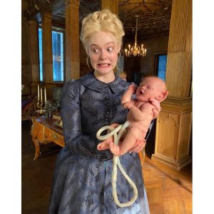 Elle Fanning Instagram - Our crew pulled off the unimaginable through a raging pandemic, bringing their abundance of talent and diligence over a whopping 9 months. 
Season 2 is a true showcase of their skill. And quite literally would not have happened without them. It is easy to see the effortless opulence in our show, but it takes a copious amount of effort. The time and thought spent crafting each prop, sculpting every wig, painting murals, lighting sets, designing FOOD etc. is a wonder to behold. I was lucky enough to have a front row seat to watch their brilliance in action. Raise your vodka shot to the creative forces behind THE GREAT! And enjoy more BTS shenanigans. @hulu @thegreathulu