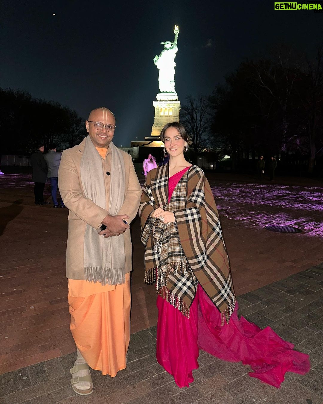 Elli AvrRam Instagram - Still overwhelmed! Received ‘Indian by Heart’❤️ At The Most Influential Indian Awards By Elite Magazine. Grateful!!!🙏 Thank you @puraskar and Team Elite Magazine for acknowledging me and my journey in the Indian film industry, and my travel show ‘India with Elli’. It was probably the most magical evening I have experienced so far! At The Statue of Liberty in New York City! Together with extremely wonderful, hardworking, passionate and inspiring personalities.🌟 wow….I am still in awe of the stories that were shared. Dare to Dream Big and Dare to be Authentic all the way and consistent! That’s the key! Lots of love to my Incredible India🇮🇳 #awardnight #statueofliberty #newyorkcity #elitemagazine #indianbyheart #mostinfluentialindians #daretodream #achieve #enjoythejourney #elliavrram #yourstruly The Statue of Liberty NYC