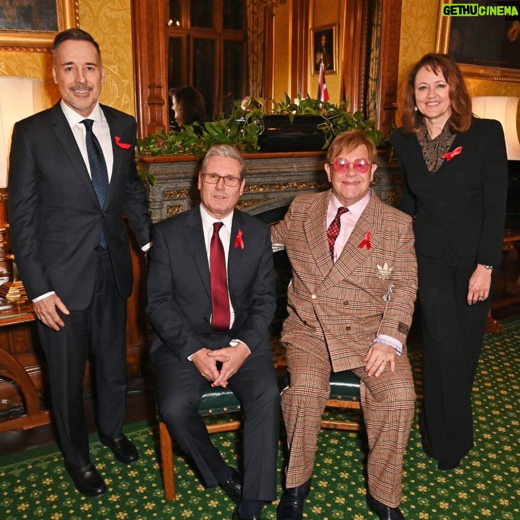 Elton John Instagram - Ahead of #WorldAIDSDay, I am honoured to receive recognition for my lifetime work with @ejaf from @appg.hiv.aids during a special reception at Speakers House. It was great to meet with political leaders, with @davidfurnish and @anneaslett, to discuss how England could be the first country to end new cases of HIV. We can’t end AIDS without the backing of the @ukgovofficial and today, we’re delighted by @victoriaatkinsmp’s announcement to expand opt-out HIV testing to every high prevalence area across the country. My Foundation and partners led the world’s first HIV Social Impact Bond in London which proved that opt-out HIV testing in A&Es works to find and diagnose HIV in people who didn’t know they were living with the virus. Not only does it save money, more importantly, it saves lives. The earlier people know they are living with HIV, they can start treatment and prevent the spread to others. We must keep our foot on the accelerator to end AIDS. 📸: @davebenett Speakers House, The House of Commons