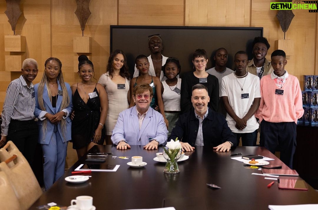 Elton John Instagram - What a week it’s been visiting @ejaf and @pepfar HIV prevention and care projects in Johannesburg with Congress leaders to celebrate what the past 20 years of funding has achieved – saving lives and creating brighter futures for millions of people. @davidfurnish and I were thrilled to meet so many young people taking part in @ejaf programmes. Through innovative tech we are helping young people talk about sex, love and relationships and supporting their mental and sexual health. The future is theirs for the taking! We must keep our foot on the accelerator to continue this remarkable progress in partnership with @pepfar. My thanks go to all of the amazing medical staff, youth mentors, educators and of course those wonderful young people we met along the way. Til next time South Africa! #HIV #AIDS #PEPFAR20 #Triggerise #BWiseHealth #Praekelt