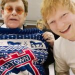 Elton John Instagram - Went with @eltonjohn to watch our boyhood teams play each other, to celebrate 2 years of Merry Christmas. Out now on all platforms, and Merry Christmas you wonderful people x