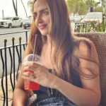 Esha Deol Instagram - This place 🫶🏼 ..Those years come flashing by where I can literally see my 20 year old self doing the things I did on these streets- I have shot here for various films back in the day & have such lovely memories. . So Sitting here .. on the beach front foreign land . . chilling with my ice tea.. reminiscing the old & creating new ones ♥️🧿 #nostalgia #memories #travel #metime #beachfront #throwbackthursday #eshadeol #gratitude ♥️🧿