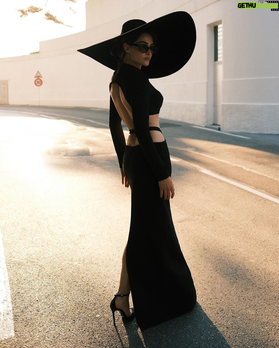 Esra Bilgiç Instagram - we see a girl with a big black hat and always in black. #Cannes23 Cannes, French Riviera, France