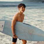 Ethan Wacker Instagram – When in Hawaii, you kinda have to surf 🏄🏼‍♂️. Don’t let these pics fool you tho, I’m so bad at it 😭😂 Honolulu, Hawaii