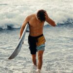 Ethan Wacker Instagram – When in Hawaii, you kinda have to surf 🏄🏼‍♂️. Don’t let these pics fool you tho, I’m so bad at it 😭😂 Honolulu, Hawaii