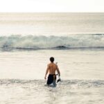 Ethan Wacker Instagram – When in Hawaii, you kinda have to surf 🏄🏼‍♂️. Don’t let these pics fool you tho, I’m so bad at it 😭😂 Honolulu, Hawaii