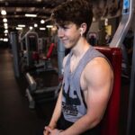Ethan Wacker Instagram - A lot of people have been asking me for my workout routine. This is my chest workout. KEEP IN MIND I AM NOT A TRAINED PROFESSIONAL!! I am just someone who works out a lot and this is what works for me: •Start with 5-10 mins of stretching •Flat Bench Press: 5 sets 8-10 reps per set. 2 sets of pause reps at the end with reduced weight, 8-10 reps per set. •Incline Dumbbell Bench Press: 5 sets, 10-12 reps per set •Chest Flys: 5 sets, 10-12 reps per set •Chest Press Machine: 3 sets, 10-15 reps per set •Dips: 3 sets, to failure each set •Cable Flys: 3 sets, 8-10 reps per set. Lmk in the comments if you want to see the workouts I do for back and biceps, shoulders, and abs. I’ll get back to doing legs soon, still got about a month or so until I can start using my leg in workouts. UFC GYM