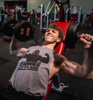 Ethan Wacker Instagram - A lot of people have been asking me for my workout routine. This is my chest workout. KEEP IN MIND I AM NOT A TRAINED PROFESSIONAL!! I am just someone who works out a lot and this is what works for me: •Start with 5-10 mins of stretching
•Flat Bench Press: 5 sets 8-10 reps per set. 2 sets of pause reps at the end with reduced weight, 8-10 reps per set.
•Incline Dumbbell Bench Press: 5 sets, 10-12 reps per set
•Chest Flys: 5 sets, 10-12 reps per set
•Chest Press Machine: 3 sets, 10-15 reps per set
•Dips: 3 sets, to failure each set
•Cable Flys: 3 sets, 8-10 reps per set.

Lmk in the comments if you want to see the workouts I do for back and biceps, shoulders, and abs. I’ll get back to doing legs soon, still got about a month or so until I can start using my leg in workouts.