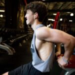 Ethan Wacker Instagram - A lot of people have been asking me for my workout routine. This is my chest workout. KEEP IN MIND I AM NOT A TRAINED PROFESSIONAL!! I am just someone who works out a lot and this is what works for me: •Start with 5-10 mins of stretching •Flat Bench Press: 5 sets 8-10 reps per set. 2 sets of pause reps at the end with reduced weight, 8-10 reps per set. •Incline Dumbbell Bench Press: 5 sets, 10-12 reps per set •Chest Flys: 5 sets, 10-12 reps per set •Chest Press Machine: 3 sets, 10-15 reps per set •Dips: 3 sets, to failure each set •Cable Flys: 3 sets, 8-10 reps per set. Lmk in the comments if you want to see the workouts I do for back and biceps, shoulders, and abs. I’ll get back to doing legs soon, still got about a month or so until I can start using my leg in workouts. UFC GYM