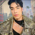 Eugene Lee Yang Instagram - Nimona press day - golden look ✨ *cue jojo’s bizarre adventure OST 🐆 styling by @colinmanderson hair & makeup by @amandawilsonmakeup wearing @helenanthonyofficial necklace by @juliaduff ear cuffs by @atavuscouture