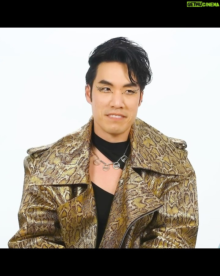 Eugene Lee Yang Instagram - Nimona press day - golden look ✨ *cue jojo’s bizarre adventure OST 🐆 styling by @colinmanderson hair & makeup by @amandawilsonmakeup wearing @helenanthonyofficial necklace by @juliaduff ear cuffs by @atavuscouture