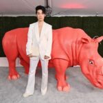 Eugene Lee Yang Instagram - NIMONA premiere! I can’t wait for y’all to experience this hilarious, heartbreaking, headstrong film that fought to be seen. Watch it on Netflix this Friday June 30! 🤘 styling by @colinmanderson makeup & hair by @monicaalvarezmakeup suit by @helenanthonyofficial necklace by @misterpurl vintage clutch by @ysl shoes by @shaunross x @unitednude New York City