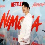 Eugene Lee Yang Instagram - NIMONA premiere! I can’t wait for y’all to experience this hilarious, heartbreaking, headstrong film that fought to be seen. Watch it on Netflix this Friday June 30! 🤘 styling by @colinmanderson makeup & hair by @monicaalvarezmakeup suit by @helenanthonyofficial necklace by @misterpurl vintage clutch by @ysl shoes by @shaunross x @unitednude New York City