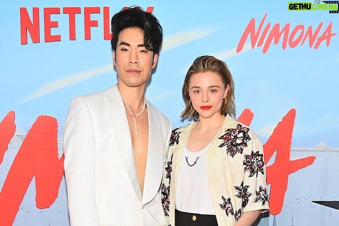 Eugene Lee Yang Instagram - NIMONA premiere! I can’t wait for y’all to experience this hilarious, heartbreaking, headstrong film that fought to be seen. Watch it on Netflix this Friday June 30! 🤘 styling by @colinmanderson makeup & hair by @monicaalvarezmakeup suit by @helenanthonyofficial necklace by @misterpurl vintage clutch by @ysl shoes by @shaunross x @unitednude New York City