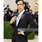 Eugene Lee Yang Instagram – #metgala 
hair by @daviddanggg 
makeup by @vanmakeupnyc 
nails by @sojinails 
necklace by @ericksonbeamon 
vintage tuxedo by @dior @hedislimane 
shoes by @jimmychoo 
special thanks to @derekblasberg @nickbrown @voguemagazine & @metmuseum The Metropolitan Museum of Art, New York