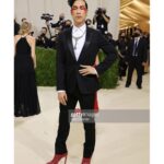 Eugene Lee Yang Instagram – #metgala 
hair by @daviddanggg 
makeup by @vanmakeupnyc 
nails by @sojinails 
necklace by @ericksonbeamon 
vintage tuxedo by @dior @hedislimane 
shoes by @jimmychoo 
special thanks to @derekblasberg @nickbrown @voguemagazine & @metmuseum The Metropolitan Museum of Art, New York