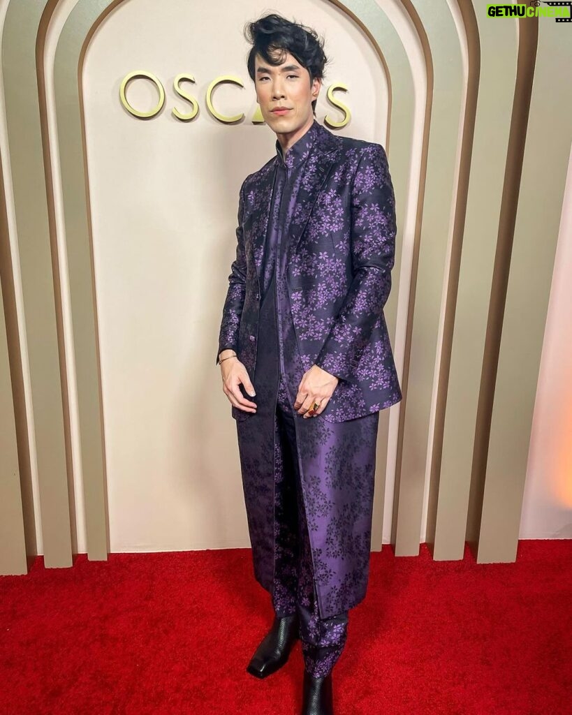 Eugene Lee Yang Instagram - Oscars Nominees Luncheon🪻 #Nimona styling by @colinmanderson hair by @daviddanggg makeup by @ariannachayleneblean suit by @hiromi.asai ear cuffs by @ladygreyjewelry ring & bracelet by @noritamy shoes by @unitednude photos by @jdrenes
