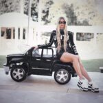 Fergie Instagram - My Uber’s here, off to #LAPRIDE 🖤🖤