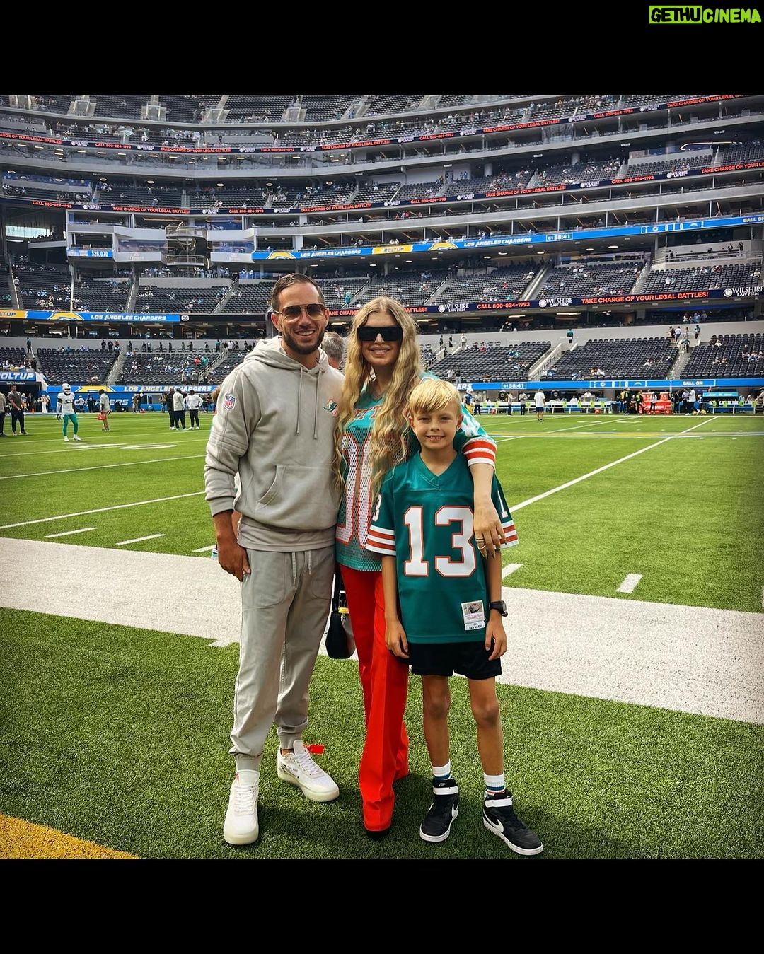 Fergie Instagram - I could feel my dad smiling down on Sunday as the @miamidolphins kicked off the season with a glorious W, and to share that joy with my family was a full circle moment. ✨✨ Thank you @garfinkeltom, @dan13marino, @natmoore_89, @mj003, Stephen Ross, Coach Mike McDaniel, Bill Galante and this incredible team for making this day a magical one. #finsup 🐬🐬