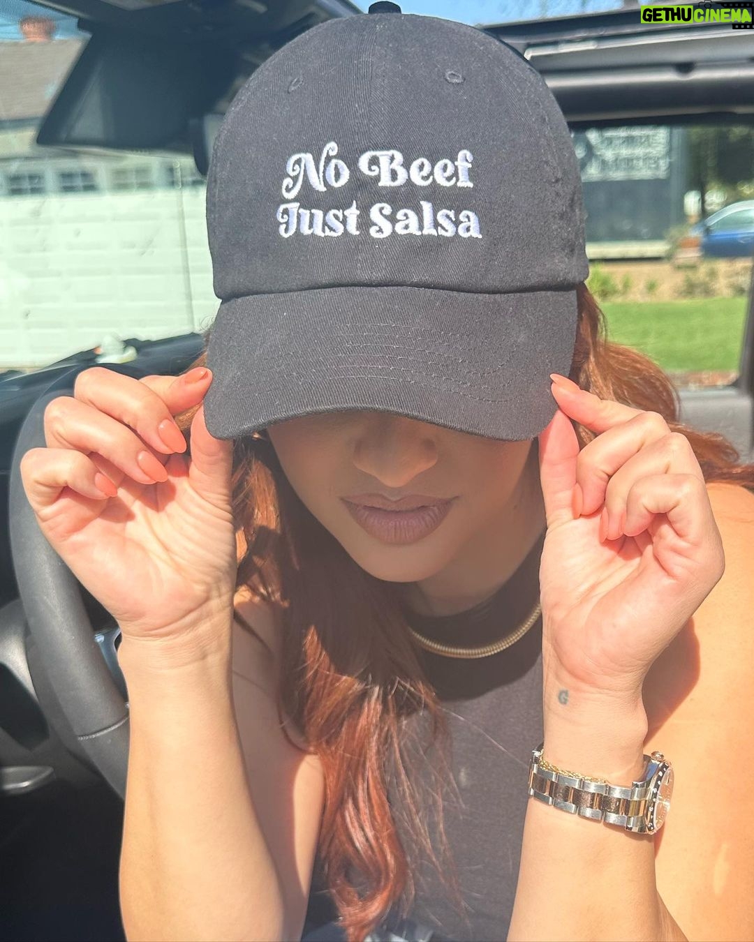 Francia Raísa Instagram - I got in trouble for not bringing a no beef just salsa hat for Angelica Vale today 🙈 while salsa is getting restocked you have the chance to purchase your shirt or hat. It’s a LIMITED time drop and if you win a hat or shirt with my initials hidden inside it will unlock a very fun opportunity that i will be announcing in the future. So get yours now. Excited to see who the lucky winners are 😁 @angelicavaleoriginal I’m going to send you a hat soon! LINK IN BIO!