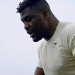 Francis Ngannou Instagram - Working to be the best version of myself March 8 ☝🏿 #JoshuaNgannou @gymshark