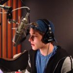 Froy Gutierrez Instagram - boy in blue recording his first audiobook. can’t wait for #whatifitsus to be out. @beckyalbertalli & @adamsilvera will steal ur heart and run away with it. check it out:) ➖🧢➖
