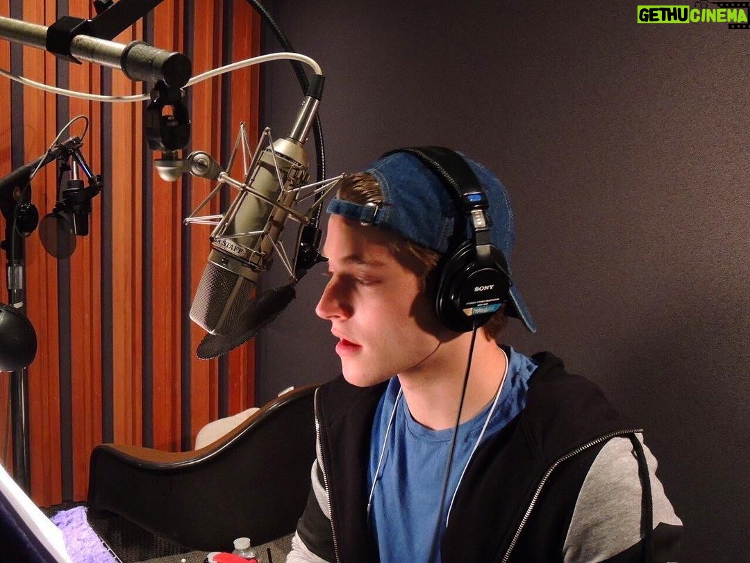 Froy Gutierrez Instagram - boy in blue recording his first audiobook. can’t wait for #whatifitsus to be out. @beckyalbertalli & @adamsilvera will steal ur heart and run away with it. check it out:) ➖🧢➖