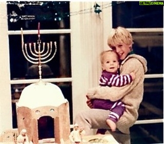 Gabriel Macht Instagram - Happy 1st night of Hanukah! That’s me at 12yrs old with @jessemachtmusic @jesse_macht who was almost 2? There’s our family synagogue we decorate with candy every year going back to 1975. I missed today’s gathering where we also celebrated my mother’s bday!!! Happy Birthday Mom and Happy Hanukah!