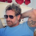 Gabriel Soto Instagram - Blue in my @alo @alomen 😎👕 @ @breathlesscancunsoul ☀️🌊🌏🐉 Breathless Cancun Soul Resort & Spa