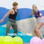 Garrett Clayton Instagram - Tag the person the parson you’d play this game with! This weeks episode is Booty Balloon Pop with @montanatucker 🥳 three rounds popping balloons in various races! Link in my Bio to the YouTube episode! #Vgames #viralgames #challenges