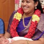 Gayathri Yuvraaj Instagram - “Embracing joy as we celebrate our daughter’s naming ceremony! 🌸✨ Blessed with love, surrounded by family, and showered with heartfelt wishes. Welcome to the world, our little angel! YUGA 👶🎉 Designed by @purpletreeprojects Shot by @gk_.photography._ Edited by @shot_by_chitti Saree by @sj_trends_and_fashion__ Baby cute pavadai by @ilandhalir #BabyJoy #NamingCeremony #blessedparents
