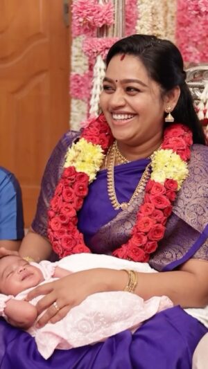 Gayathri Yuvraaj Instagram - “Embracing joy as we celebrate our daughter’s naming ceremony! 🌸✨ Blessed with love, surrounded by family, and showered with heartfelt wishes. Welcome to the world, our little angel! YUGA 👶🎉
 
Designed by @purpletreeprojects 
Shot by @gk_.photography._ 
Edited by @shot_by_chitti 
Saree by @sj_trends_and_fashion__ 
Baby cute pavadai by @ilandhalir 

 #BabyJoy #NamingCeremony  #blessedparents