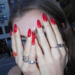 Genevieve Hannelius Instagram - I’m so excited to share something that I’ve been working on for over 2 years… @gpolishofficial Reusable Press-On Nails!!! I’ve been wear testing and researching to find you the best quality nails and trying countless formulas of Brush-On Nail Glue so that you can have the most durable and long-lasting manicure ever. Not to mention the designs are cute af if I do say so myself. This project started when my friends and I were talking about how we WISHED we could just drop our nails off at the salon and pick them up later. I couldn’t find Press-On Nails that were the trifecta of long-lasting, affordable, and CUTE. So I made some!!! And I hated those little nail glue sticks so we have a mess-free Brush-On Nail glue that is the freaking best- I’m telling you these last WEEKS and come off so gently with no damage. This has been a labor of love and I’m so proud to bring you a product that I’m truly obsessed with, and I know you will be too. Shop now at the link in my bio🌟💋