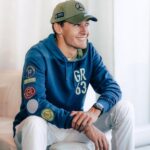 George Russell Instagram - Celebrating George’s 100 Grands Prix with this vintage-inspired drop. 🦅 Head to the link in bio to get yours, exclusively via the Team Store. 📲