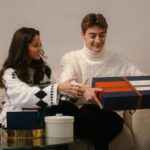 George Russell Instagram - The art of wrapping 🎄🎁 Watch as @georgerussell63 and @carmenmmundt spread some festive cheer. #TommyHilfiger #HolidayGift