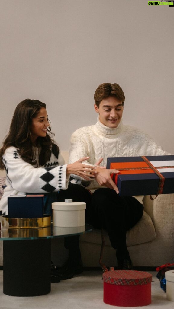 George Russell Instagram - The art of wrapping 🎄🎁 Watch as @georgerussell63 and @carmenmmundt spread some festive cheer. #TommyHilfiger #HolidayGift
