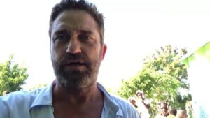 Gerard Butler Instagram - What an eventful couple of weeks. Been cheered up to no end by these beautiful souls who despite living in a country that has gone through so much hardship, have nothing but love to give. A real lesson for me right now. So pleased to be in Haiti with @MarysMeals visiting schools to see the wonderful work they do. Communities are transformed by what @MarysMeals does to feed children in a place of education. It’s such a simple idea that works really well. I’ve seen it in action in Liberia, and now Haiti.  Link in bio for their website MarysMeals.org, or follow @MarysMeals for more pictures and videos from this trip! #Haiti #MarysMeals #school #meals #hope #joy #food #education