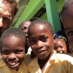 Gerard Butler Instagram - What an eventful couple of weeks. Been cheered up to no end by these beautiful souls who despite living in a country that has gone through so much hardship, have nothing but love to give. A real lesson for me right now. So pleased to be in Haiti with @MarysMeals visiting schools to see the wonderful work they do. Communities are transformed by what @MarysMeals does to feed children in a place of education. It’s such a simple idea that works really well. I’ve seen it in action in Liberia, and now Haiti.  Link in bio for their website MarysMeals.org, or follow @MarysMeals for more pictures and videos from this trip! #Haiti #MarysMeals #school #meals #hope #joy #food #education