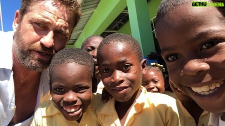 Gerard Butler - 156.5K Likes - What an eventful couple of weeks. Been cheered up to no end by these beautiful souls who despite living in a country that has gone through so much hardship, have nothing but love to give. A real lesson for me right now. So pleased to be in Haiti with @MarysMeals visiting schools to see the wonderful work they do. Communities are transformed by what @MarysMeals does to feed children in a place of education. It’s such a simple idea that works really well. I’ve seen it in action in Liberia, and now Haiti. Link in bio for their website MarysMeals.org, or follow @MarysMeals for more pictures and videos from this trip! #Haiti #MarysMeals #school #meals #hope #joy #food #education