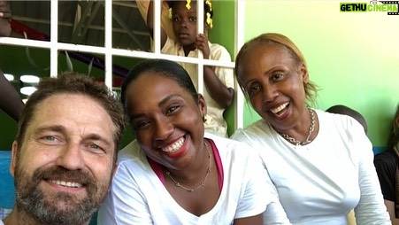 Gerard Butler Instagram - What an eventful couple of weeks. Been cheered up to no end by these beautiful souls who despite living in a country that has gone through so much hardship, have nothing but love to give. A real lesson for me right now. So pleased to be in Haiti with @MarysMeals visiting schools to see the wonderful work they do. Communities are transformed by what @MarysMeals does to feed children in a place of education. It’s such a simple idea that works really well. I’ve seen it in action in Liberia, and now Haiti.  Link in bio for their website MarysMeals.org, or follow @MarysMeals for more pictures and videos from this trip! #Haiti #MarysMeals #school #meals #hope #joy #food #education