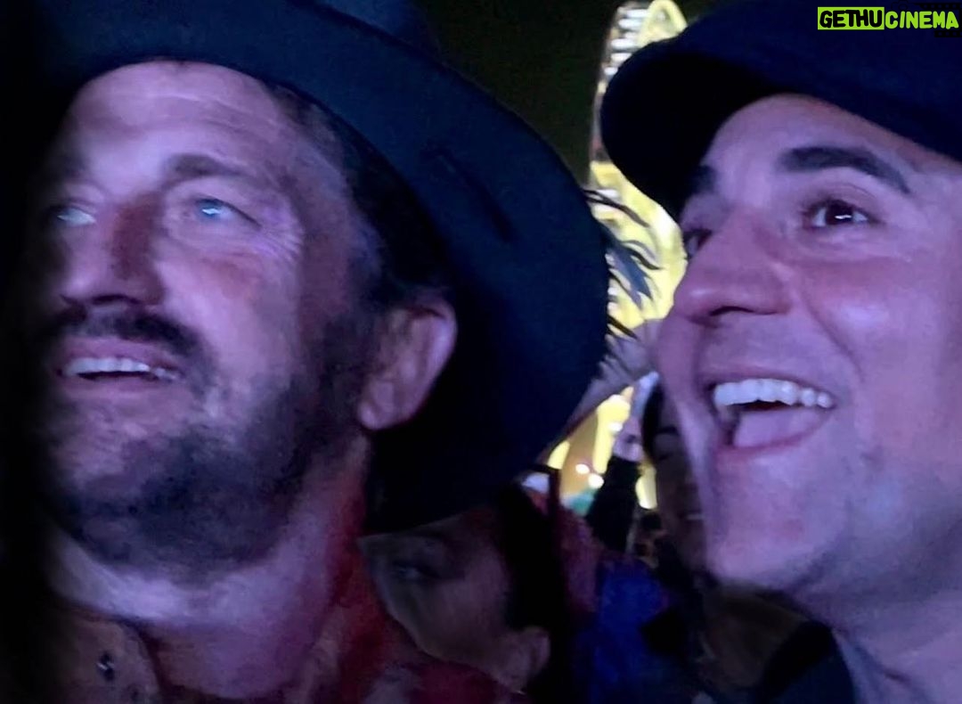 Gerard Butler Instagram - I am devastated by the sudden passing of my dear friend Darius, a true brother in arms. My thoughts and love go to his wonderful mum and dad Avril and Booth and his two brilliant brothers Aria and Cyrus. To those lucky enough to have met Darius for more than a few minutes, they were deeply moved by his infectious laugh and barely containable zest for life. He was always armed with a smile, a booming voice, and a genuinely warm embrace that few could resist-nor would they want to!!! He was an incredible talent, a singer whose voice touched your soul and an actor with great presence. But, most importantly, he had the heart of a lion. It was bigger and brighter than the sun and an energy so contagious he could light up a room in seconds. Our boy Darius was always constant and unwavering in his passion for life. But a bigger constant was his dream to inspire others to better themselves. He talked the talk but boy, did he walk the walk. He had such purity of thought, a deep wisdom and constant gratitude for people, for life, a compassion towards all. His hilarious self-deprecating sense of humor (he was funny as shit) allowed him to stay humble - something he valued deeply. Darius’ undying commitment to being of service to individuals- his family, his friends (none more so than me) and to the world at large made him the perfect friend- He led by example but he was also a teacher, as he pushed those he loved to be the best possible versions of themselves. The universe unfolds in ways we may not agree with or even understand. Somewhere in there I believe there is, or will be, some meaning in why he left us so early. If it was nothing more than teaching us to live with that open heart, putting others first and never taking ourselves too seriously as we learn to traverse this wonky world we live in then, that might be enough. But something tells me there will be way more waves created by our boy Darius further down the line. My heart aches heavily. But going forward, I will beat my drum louder and celebrate life and its every beautiful moment because my brother showed me that was a pretty awesome way to go about it.