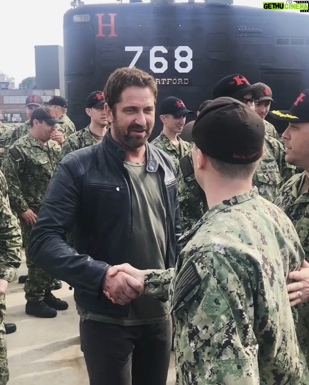 Gerard Butler Instagram - Me and my gang of misfits setting off to Groton Naval Base to show #HunterKiller. Always a privilege to visit and to see what true heroism looks like. Thank you for having me. Naval Submarine Base New London