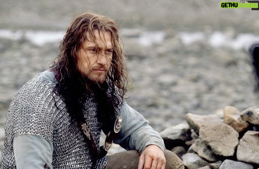 Gerard Butler - 156.2K Likes - This photo summarizes 2020 for me. Haven’t got a decent haircut in months. Ready for battle. Wearing armor. All that’s missing is a mask!