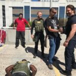 Gerard Butler Instagram - Mo licking ants off the ground. Tough times on the #DenOfThieves set. The movie drops next month.